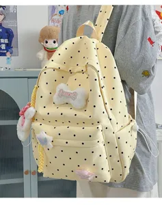 Joli sac à dos à pois style japonais pour femmes et étudiantes, sac décontracté élégant avec joli nœud.