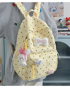 Sac à dos en toile à pois style ins japonais mignon pour femmes et étudiantes avec de beaux charms