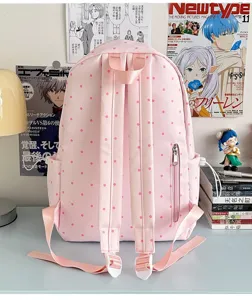 Joli sac à dos rose à pois, cartable décontracté avec bretelles réglables et poche zippée.