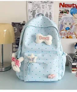 Joli sac à dos à pois de style japonais avec pendentifs en peluche pour filles et étudiantes.