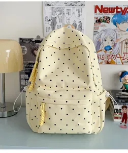 Vue détaillée du sac à dos à pois style INS japonais, joli sac à dos de loisirs jaune pour filles.