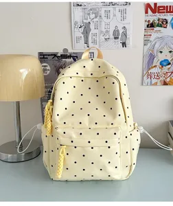 Sac à dos à pois de style japonais mignon sac d'école jaune pour femmes et filles étudiantes.