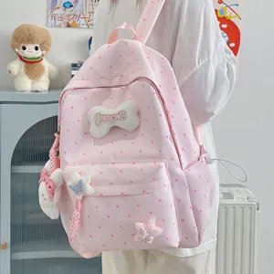 Joli sac à dos rose à pois pour femmes et étudiants, cartable décontracté avec de jolis charms.