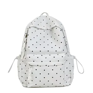 Sac à dos blanc à pois style japonais pour femmes, cartable mignon simple et élégant.