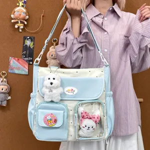 Cute polka dot canvas shoulder bag detail, multi-pocket design with transparent window.