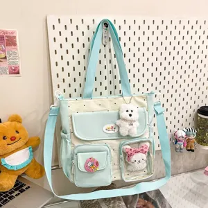Cute polka dot canvas tote shoulder bag with cute plush toys, large capacity crossbody bag.