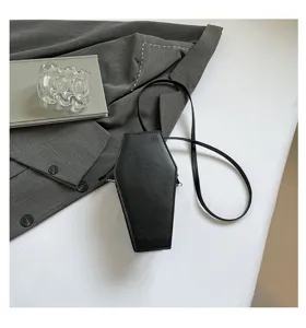 Gothic black coffin shoulder bag with slim strap, dark style crossbody purse for women.