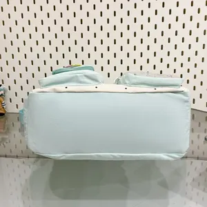 Detailed view of the cute color-blocking polka dot shoulder bag, offering large capacity for daily travel.