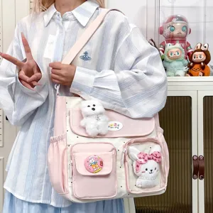Cute polka dot canvas shoulder bag with plush animal charms, large capacity casual crossbody bag.