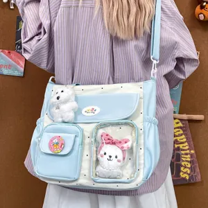 Cute polka dot canvas crossbody bag with clear window and multi-pockets, large capacity.