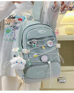 Zaino da ragazza in stile giapponese carino con grande capacità e ciondolo in peluche.