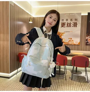Zaino scolastico in tela tie-dye per studenti, grande capacità borsa da viaggio minimalista.