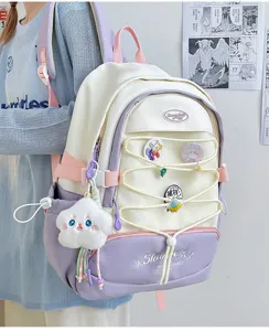 Zaino stile giapponese per ragazze grande capacità con ciondolo in peluche e badge.