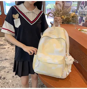 Zaino in tela tie-dye giallo per studenti, grande capacità borsa da viaggio casual elegante.