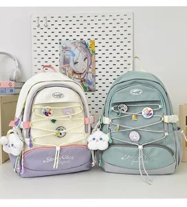 Zaino kawaii in stile giapponese per ragazze grande capacità borsa scolastica con spille.