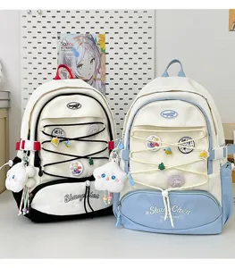 Zaino kawaii stile giapponese da ragazza grande capacità borsa scolastica con tasca a rete e spille