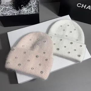 Close up detail of rhinestone rabbit hair knit hat, soft texture and sparkling crystal.