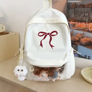 Zaino giapponese bianco carino con fiocco, finestra trasparente e grande capacità di carico.