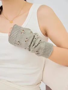 Knitted arm warmers for women winter warm fingerless gloves hollow heart cute wrist sleeves