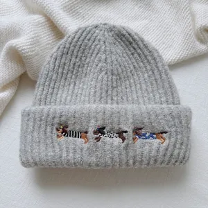 Cute dachshund embroidery detail on grey ribbed knit beanie winter warm cozy fashion accessory