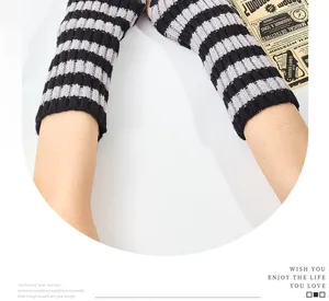 Black and grey striped knitted fingerless arm warmers, cozy wool winter sleeve accessories.