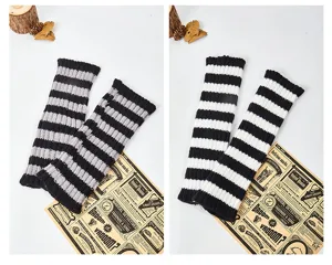 Knit striped fingerless arm warmers, cozy two-tone winter long gloves for women daily wear.