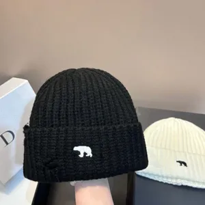 Nieuwe ijsbeer gebreide muts voor de winter, stijlvolle casual warme wollen hoed voor dames.