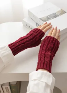 Short cable-knit fingerless gloves for autumn and winter, warm wool arm warmers in burgundy red.