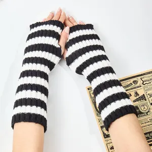 Black and white striped knitted arm warmers fingerless gloves for winter warm stylish outfits.