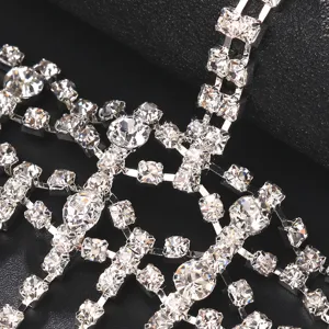 Sparkling rhinestone tassel face mask for masquerade, sexy crystal chain festival accessory.
