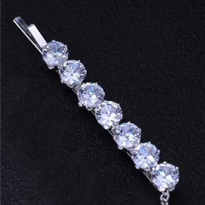 Elegant silver rhinestone bobby pin with a delicate hanging tassel chain for daily hair styling.