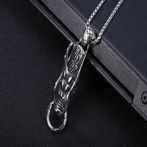 Detailed view of titanium steel dragon pendant necklace, vintage Thai silver style.