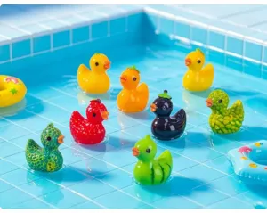Miniature fruit resin duck toy close-up, colorful cartoon animal figurine for DIY decor.