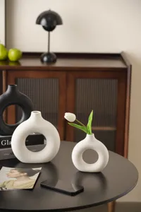 Nordic ceramic ring vase set, minimalist donut flower pots for modern home decor, white and black.