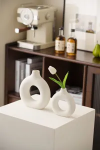 Nordic style ceramic donut vase set, modern minimalist hollow ring desktop flower arrangement.