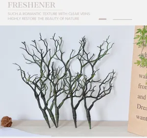 Artificial tree branches detail view, realistic fake coral branches for home decor, floral arrangements.