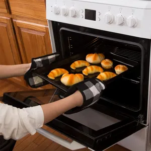 Black and white buffalo plaid oven mitts, thickened cotton heat-resistant gloves for kitchen baking.