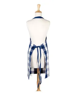 Close-up detail of blue and white buffalo check kitchen apron back ties and adjustable neck strap.