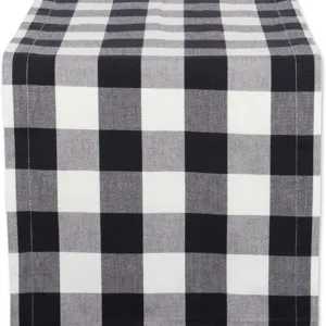 Classic black and white buffalo check table runner for modern home decor and dining tables.