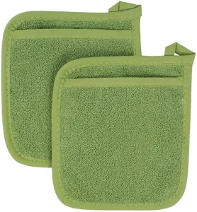Détail de manique en tissu éponge vert, gros plan tapis d'isolation, tapis résistant.