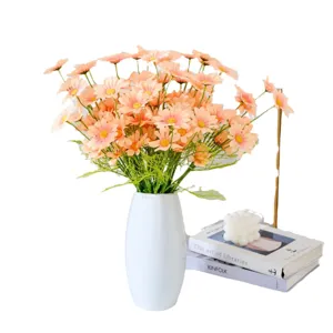 Artificial daisy flower bouquet in white ceramic vase home decor photography prop arrangement