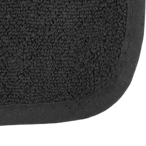 Tapis de cuisson résistant à la chaleur noir en éponge manique détail de bordure