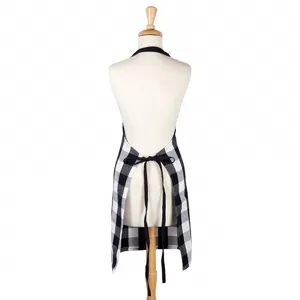 Classic black and white plaid kitchen apron with adjustable ties displayed on mannequin back view
