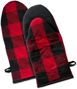 Detailed close-up of red and black buffalo plaid oven mitts with thick quilted cotton design.