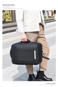 Detail view of the waterproof business USB backpack, showing sturdy handle and port design.