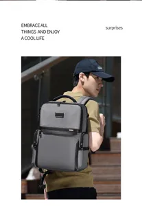 Detailed view of the stylish mens business laptop backpack in grey, ideal for daily commute.