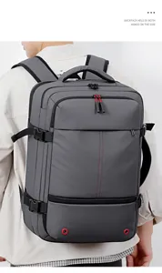 Detail view of large capacity waterproof grey business travel backpack with multi pockets.