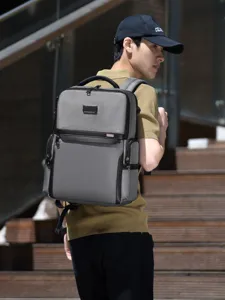 Stylish business laptop backpack for men, large capacity waterproof casual travel daypack.