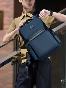 Stylish business casual backpack for men, durable travel laptop bag with large capacity.