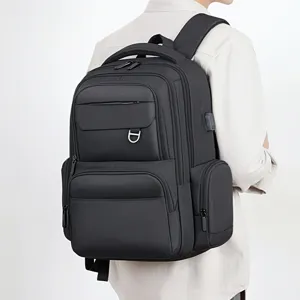 Black multi-functional business backpack with large capacity and convenient USB charging port.